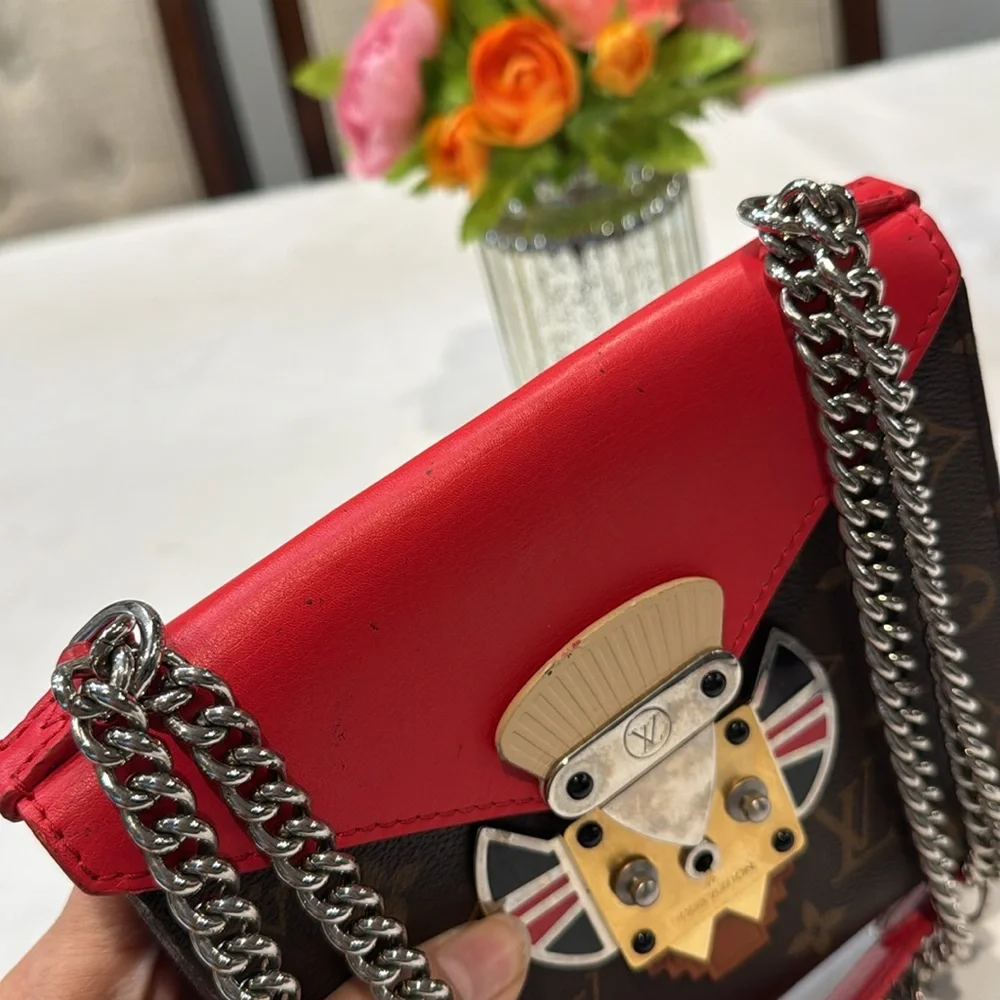 Authentic Louis Vuitton Tribal mask chained shoulder bag